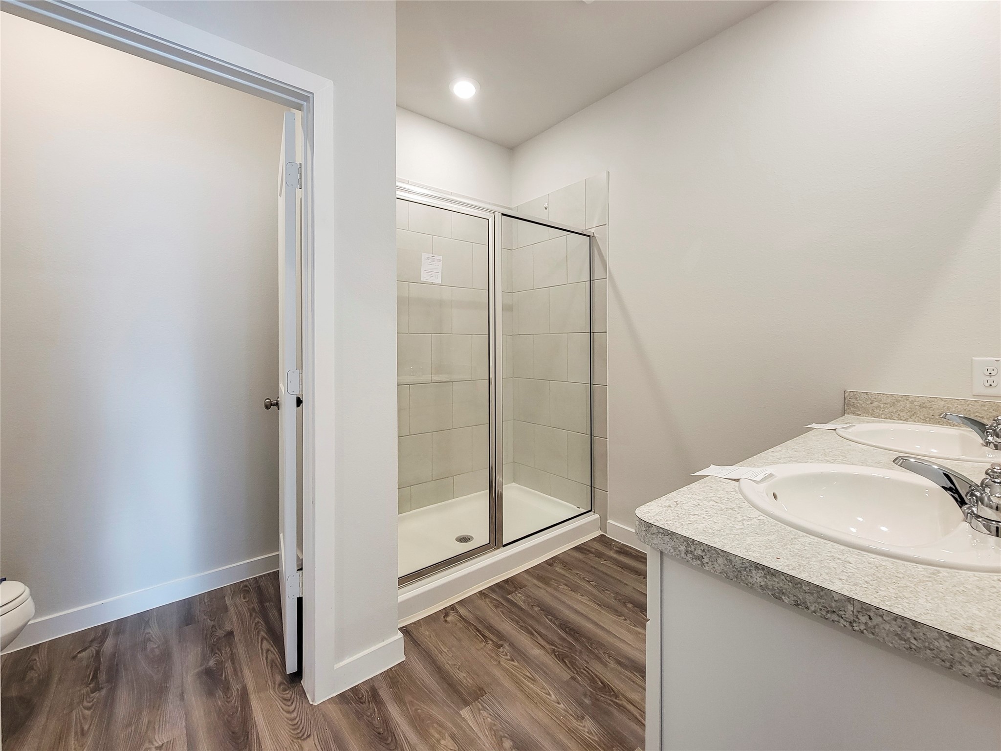 16954 Pandora Way Porter, TX 77365 - Photo 11 of 18 a bathroom with a sink and a mirror