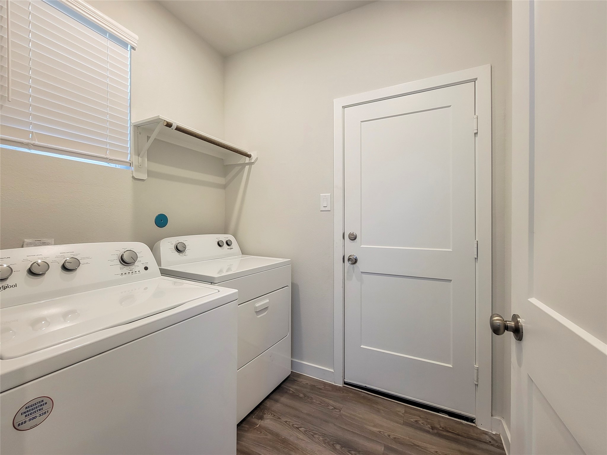 16954 Pandora Way Porter, TX 77365 - Photo 12 of 18 a utility room with dryer and washer