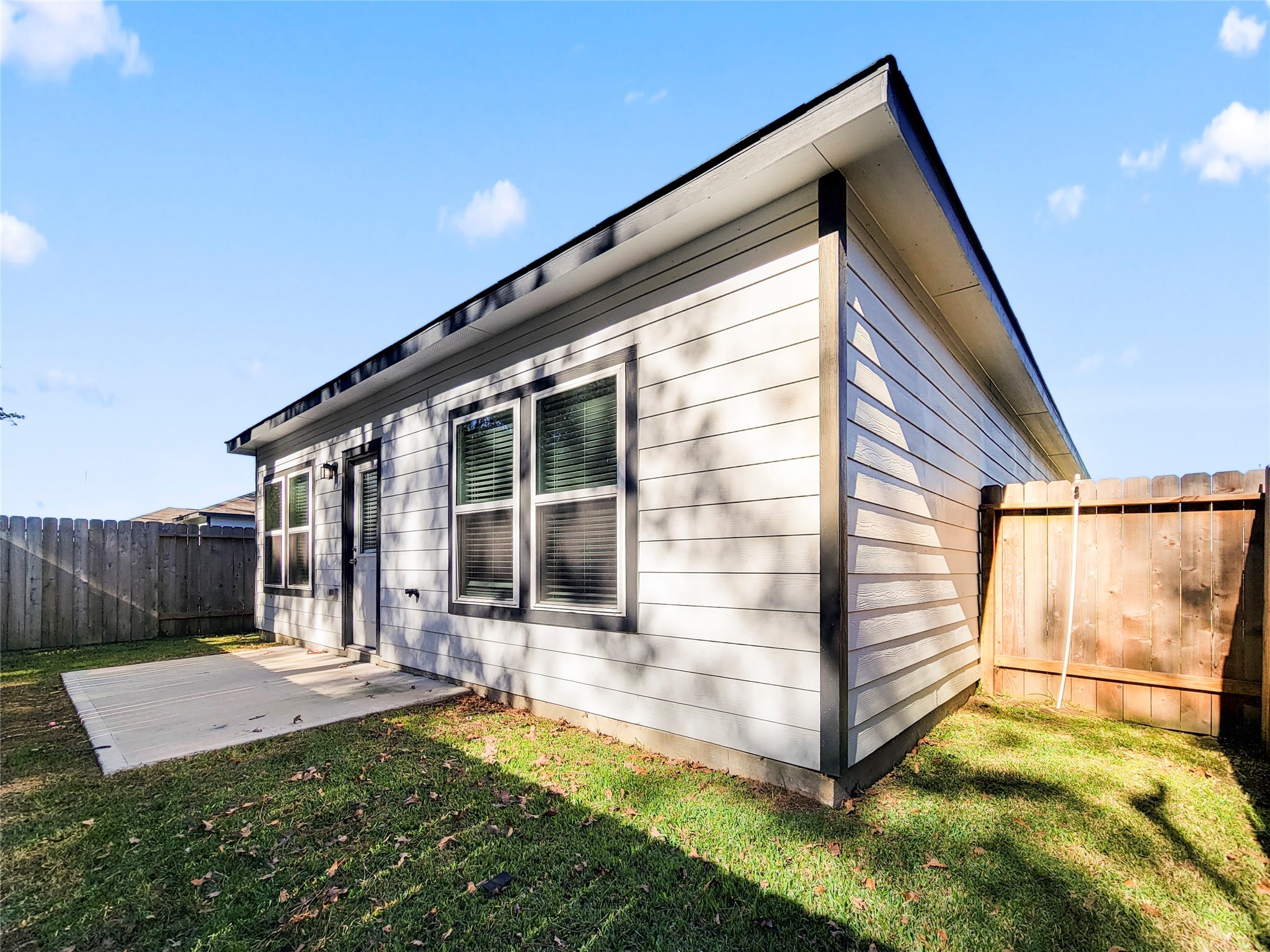 16954 Pandora Way Porter, TX 77365 - Photo 15 of 18 a view of a house with backyard and porch
