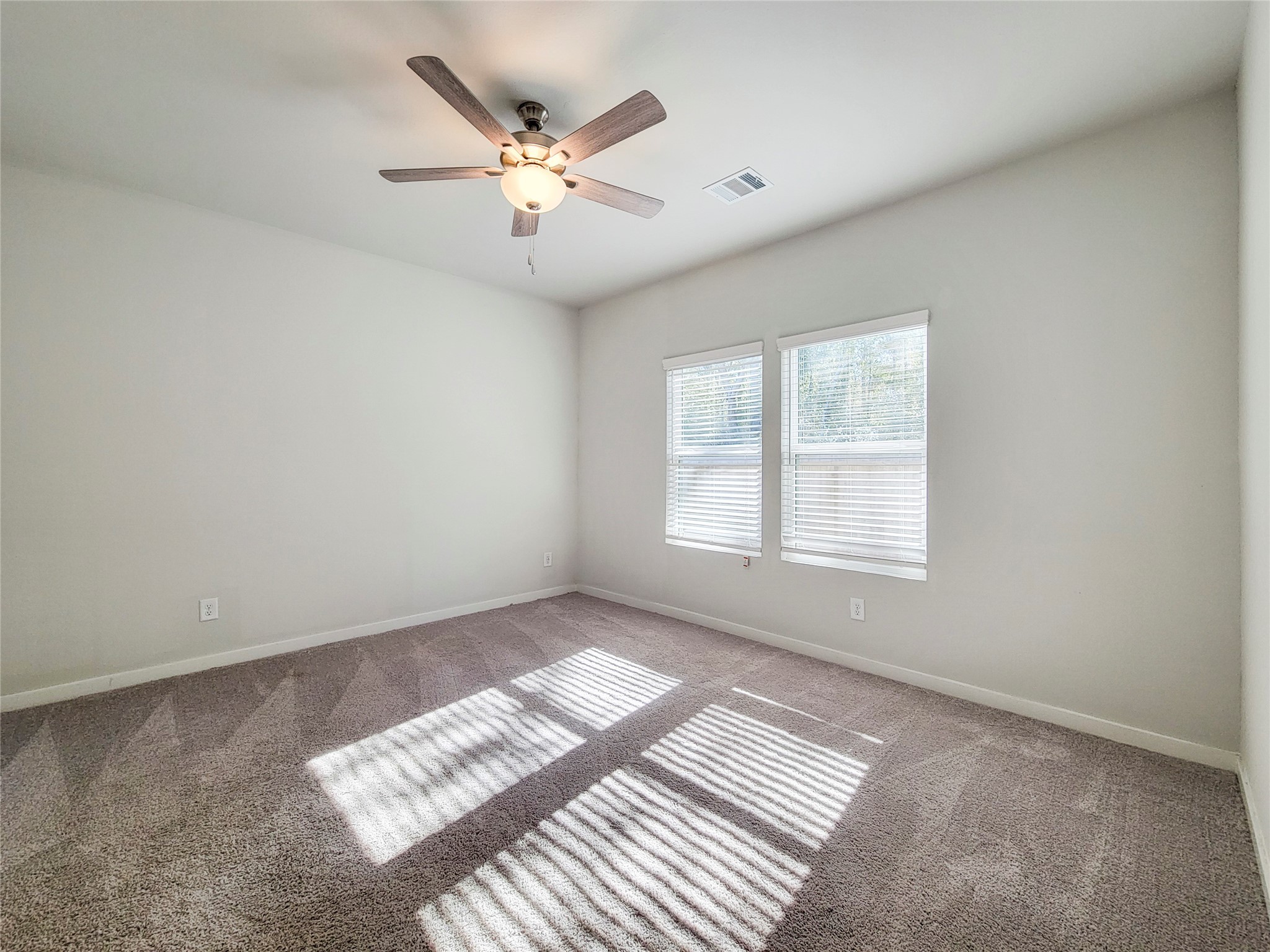 16954 Pandora Way Porter, TX 77365 - Photo 7 of 18 a view of an empty room with a window