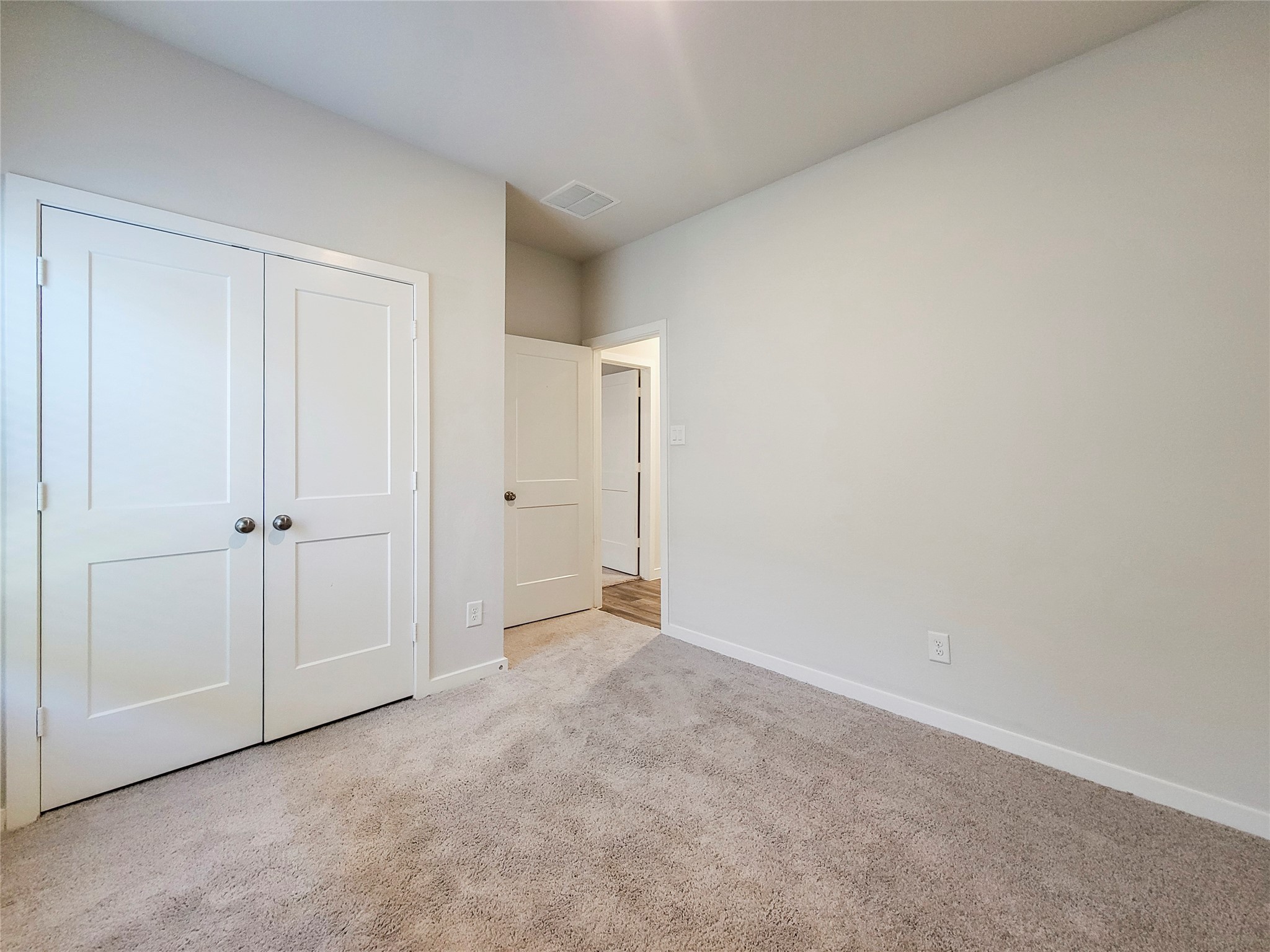 16954 Pandora Way Porter, TX 77365 - Photo 10 of 18 a view of an empty room and closet area