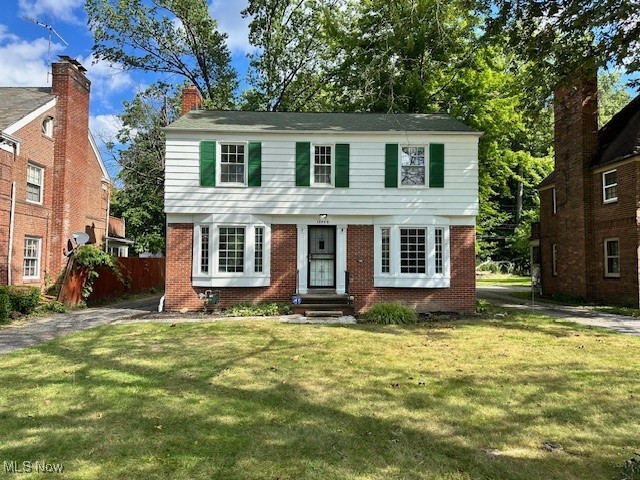 15959 Glynn Road Cleveland, OH 44112 - Photo 1 of 23 Colonial home featuring brick siding