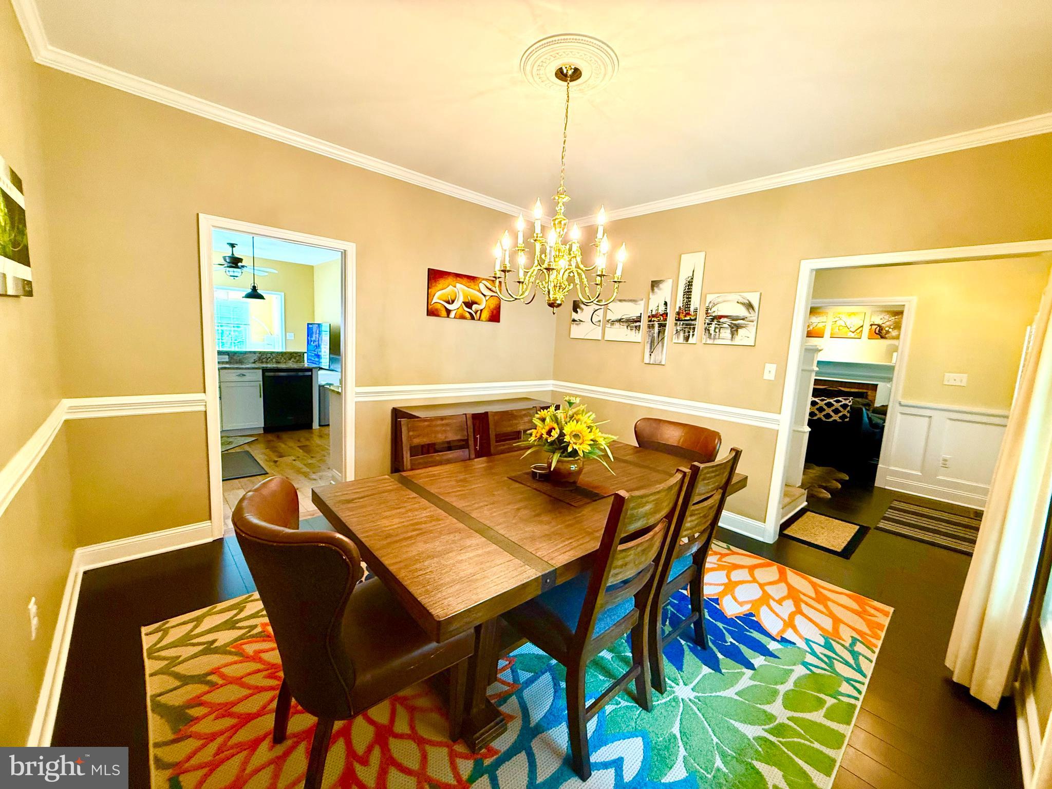 2462 Five Shillings Road Frederick, MD 21701 - Photo 30 of 55 a view of a dining room with furniture and wooden floor