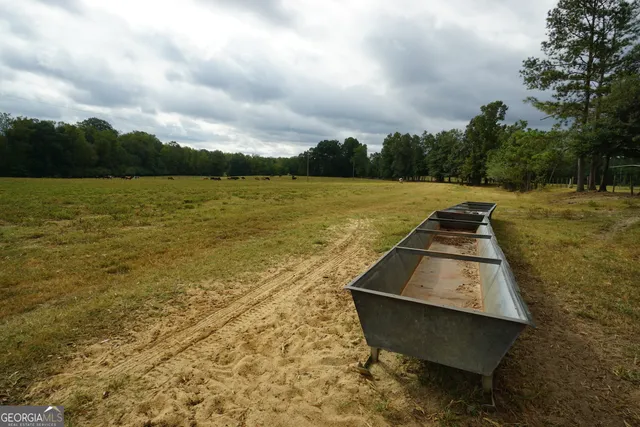 a view of a lake with a yard