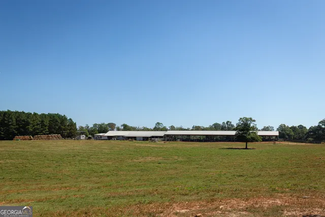 a view of water heater room with stairs