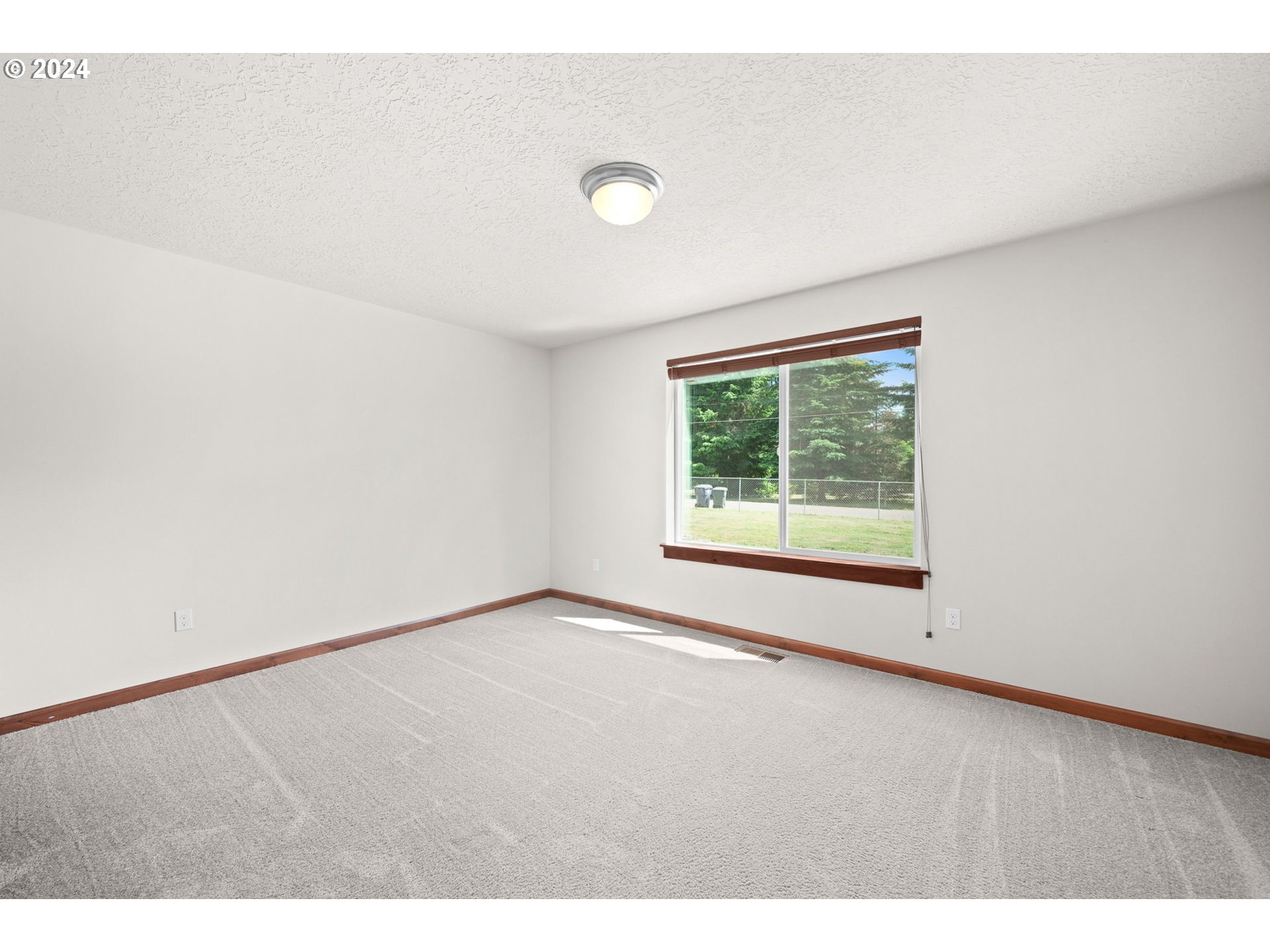 86002 Edenvale Road Pleasant Hill, OR 97455 - Photo 23 of 48 a view of an empty room with a window
