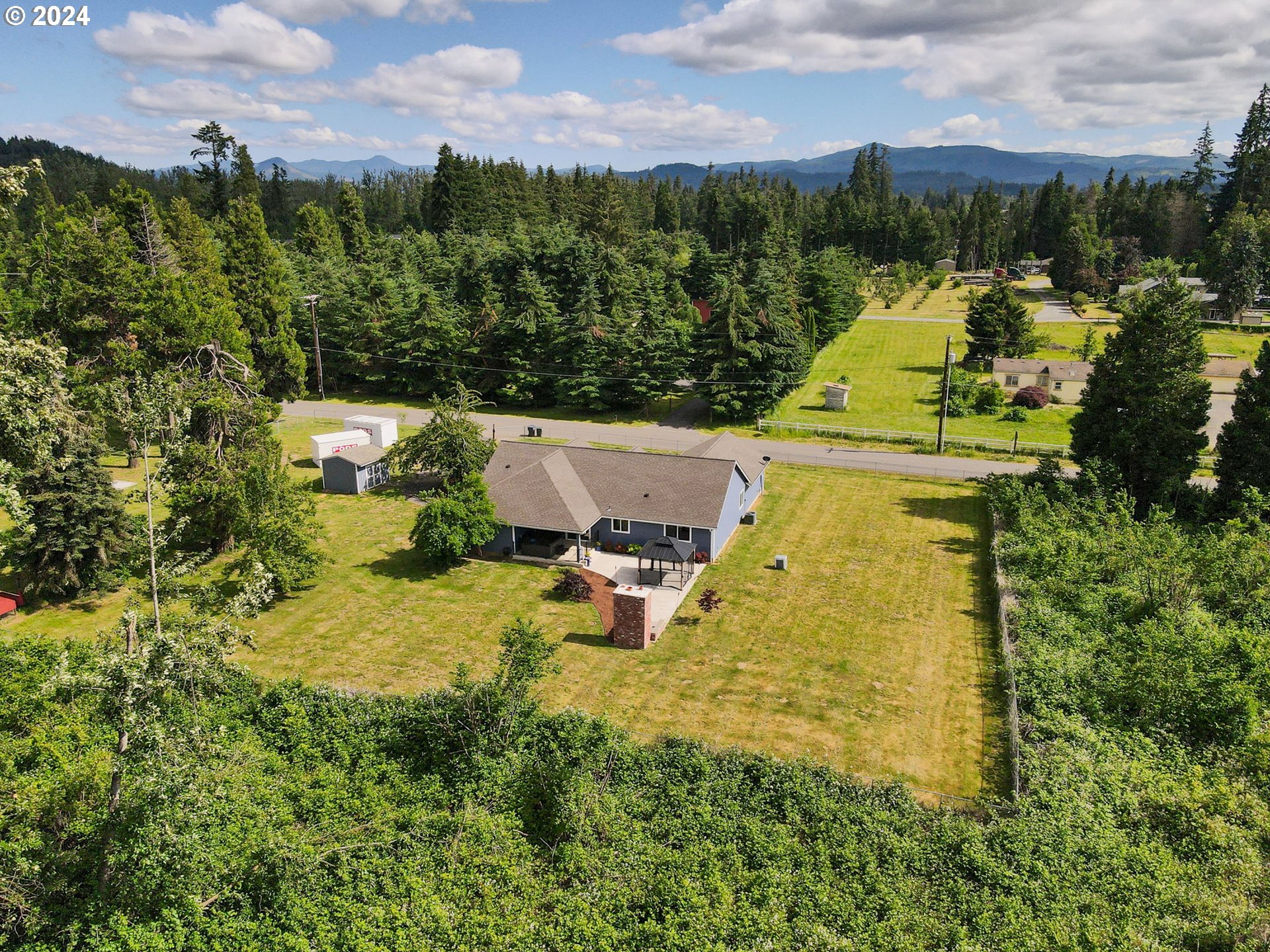86002 Edenvale Road Pleasant Hill, OR 97455 - Photo 44 of 48 an aerial view of a house with a garden