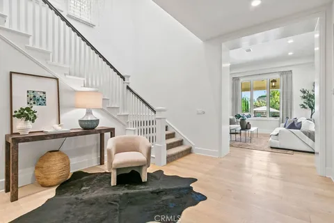 a utility room with cabinets and a window