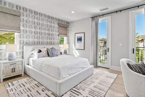 a bedroom with bed and window