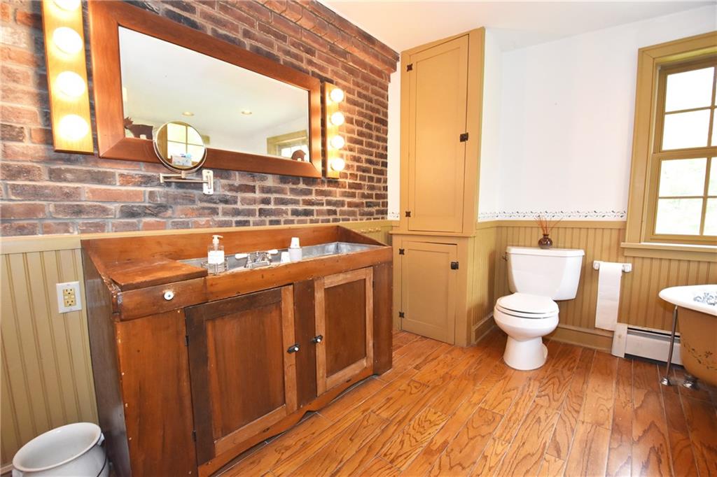 465 Bavington Road Burgettstown, PA 15021 - Photo 11 of 25 a bathroom with a toilet sink and mirror