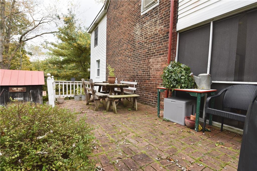 465 Bavington Road Burgettstown, PA 15021 - Photo 17 of 25 a view of a chairs and tables in the back yard of the house