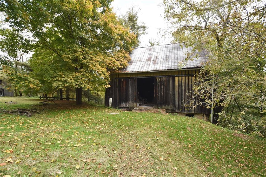 465 Bavington Road Burgettstown, PA 15021 - Photo 23 of 25 a front view of a house with a yard and trees