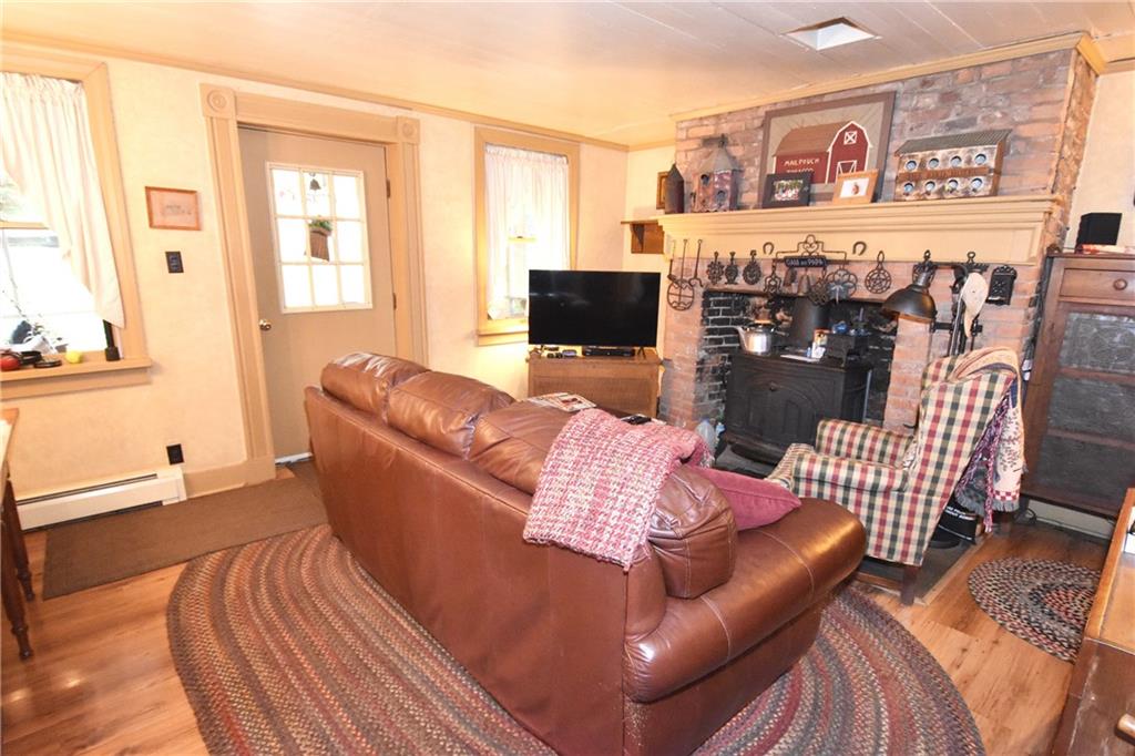 465 Bavington Road Burgettstown, PA 15021 - Photo 3 of 25 a living room with furniture and a flat screen tv