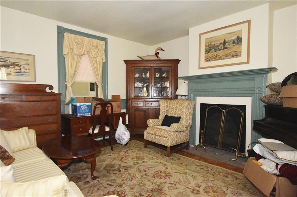 465 Bavington Road Burgettstown, PA 15021 - Photo 9 of 25 a living room with furniture and a fireplace