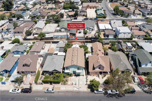 an aerial view of a city with lots of residential buildings