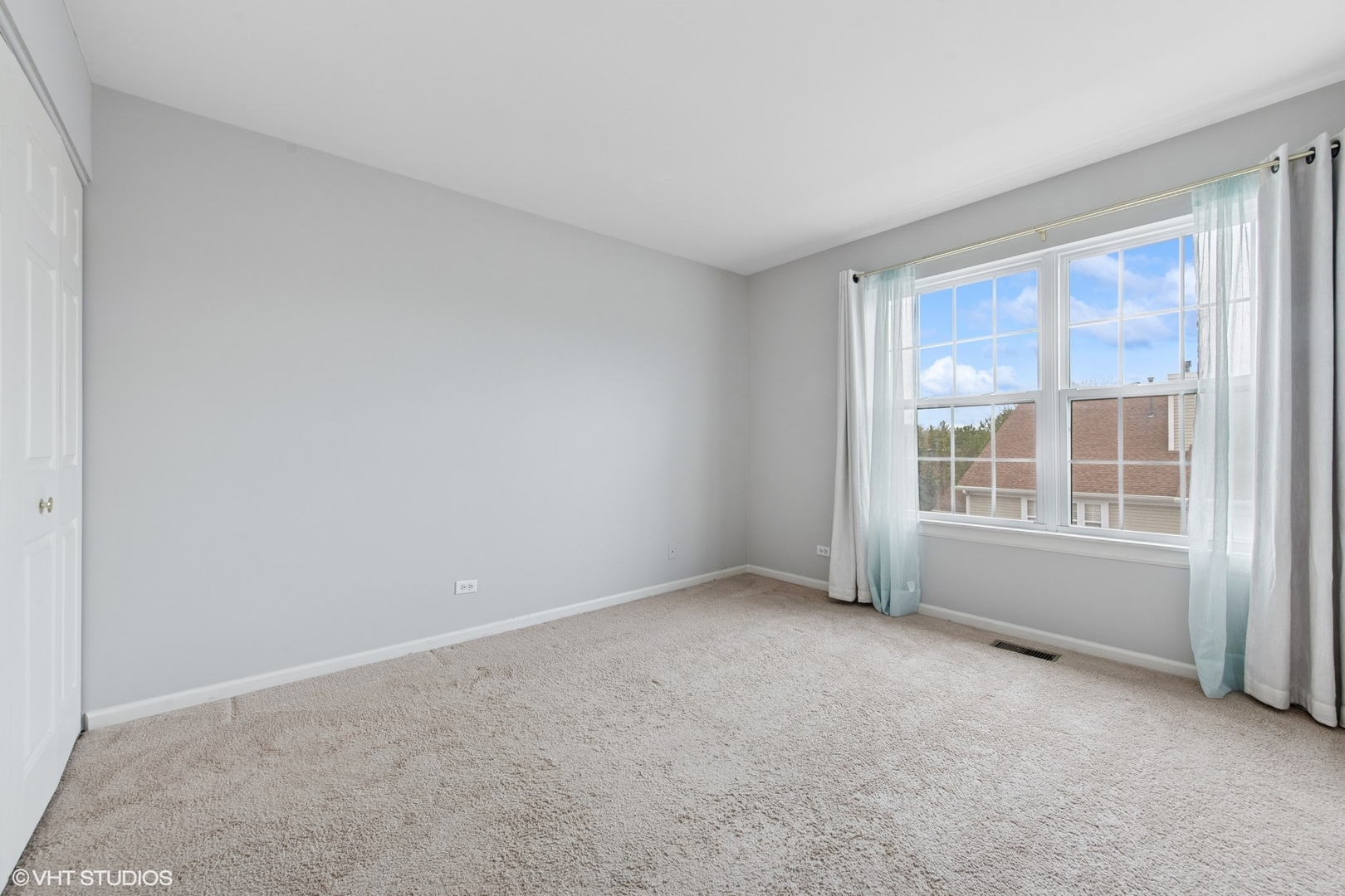 1136 Georgetown Way Vernon Hills, IL 60061 - Photo 18 of 21 a view of an empty room with a window