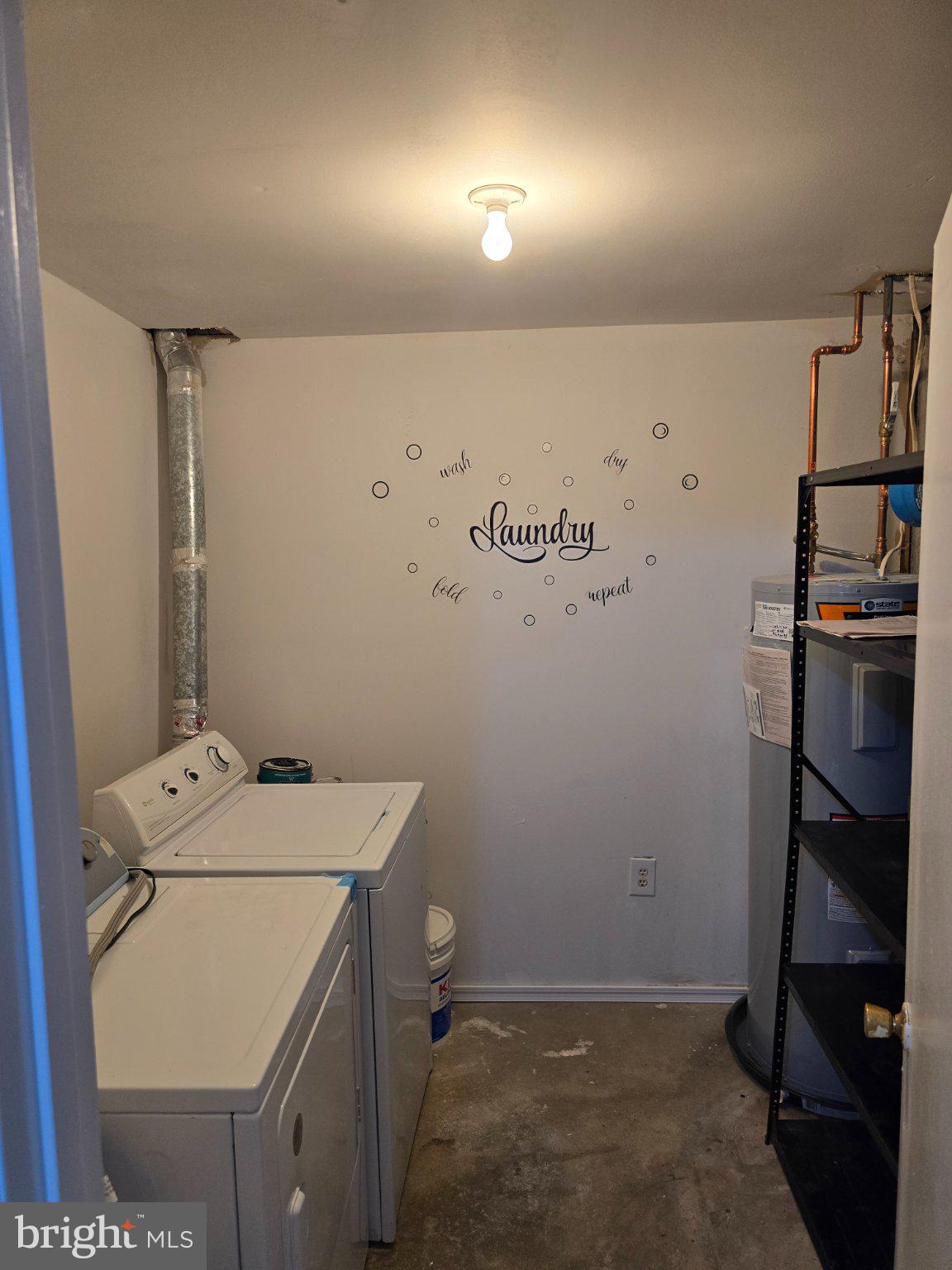 809 St Michaels Drive Bowie, MD 20721 - Photo 9 of 17 a utility room with dryer and washer