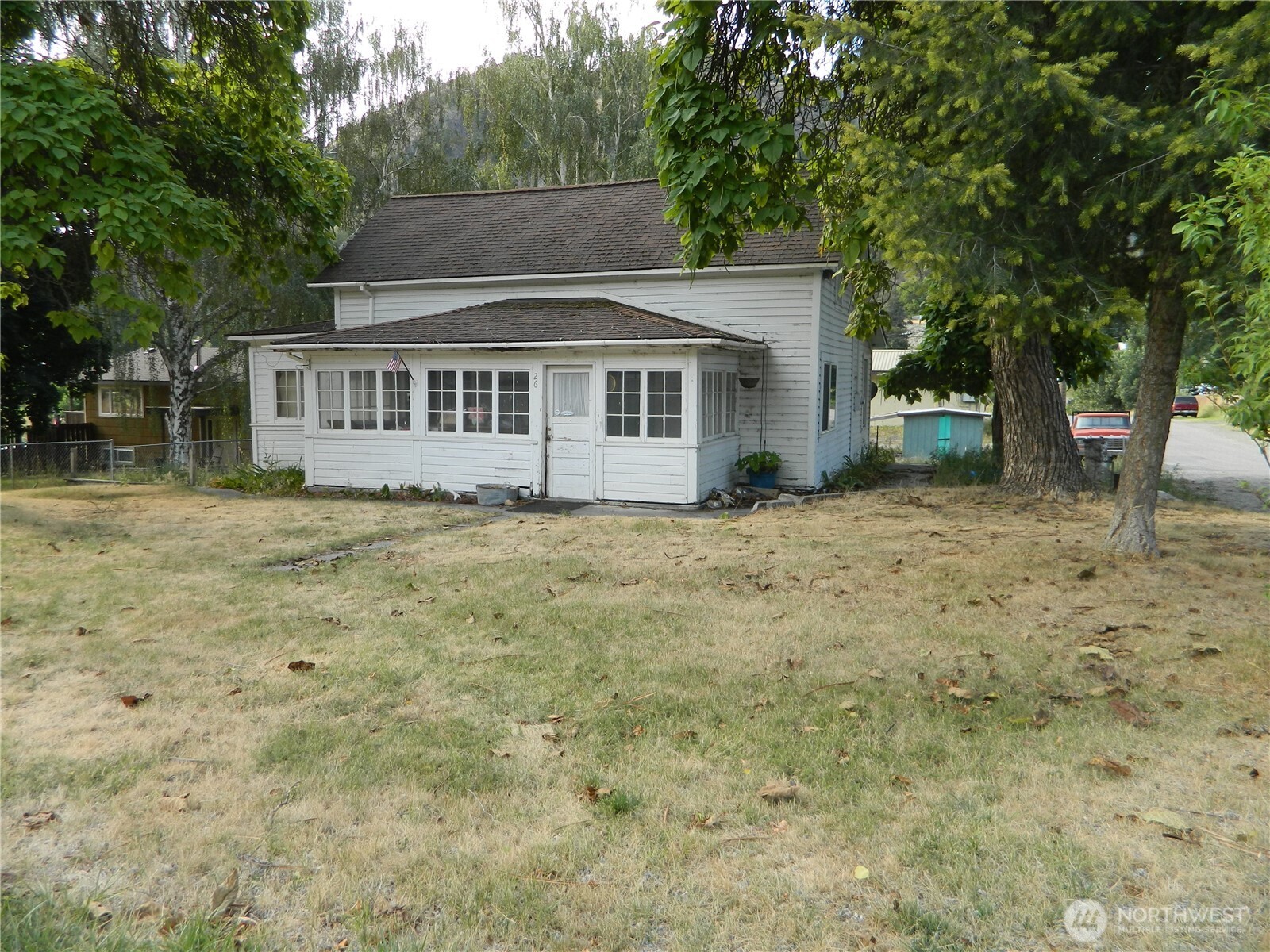 26 Palmer Avenue Loomis, WA 98827 - Photo 1 of 20 a view of a house with a yard