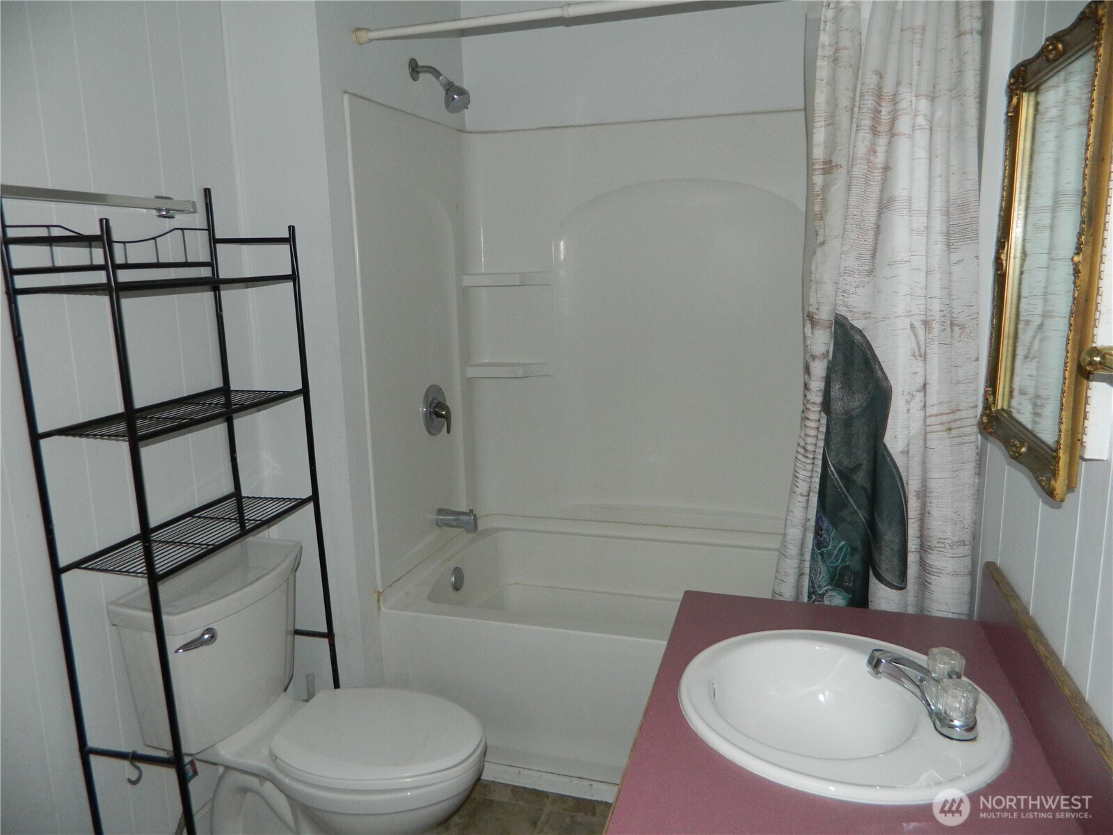 26 Palmer Avenue Loomis, WA 98827 - Photo 16 of 20 a bathroom with a toilet and a shower