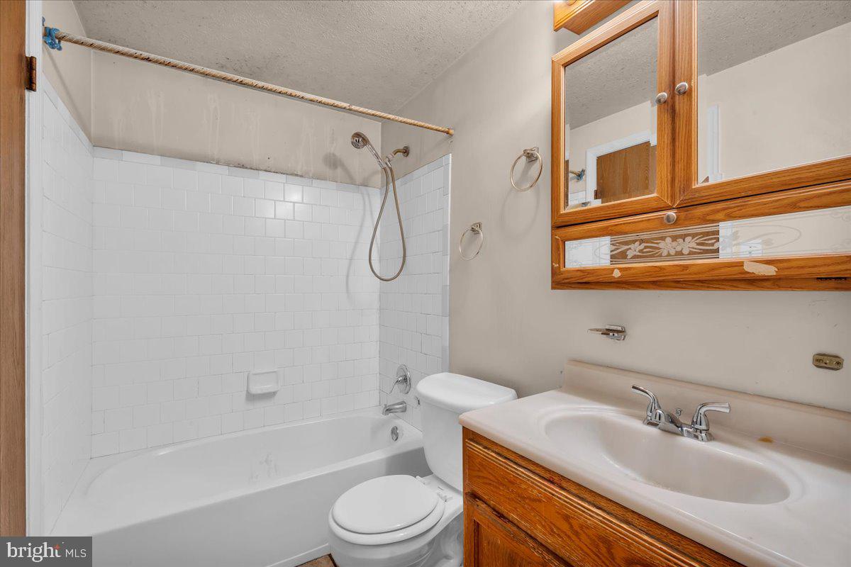 11 Decatur Lane Sicklerville, NJ 08081 - Photo 17 of 24 a bathroom with a sink toilet and shower
