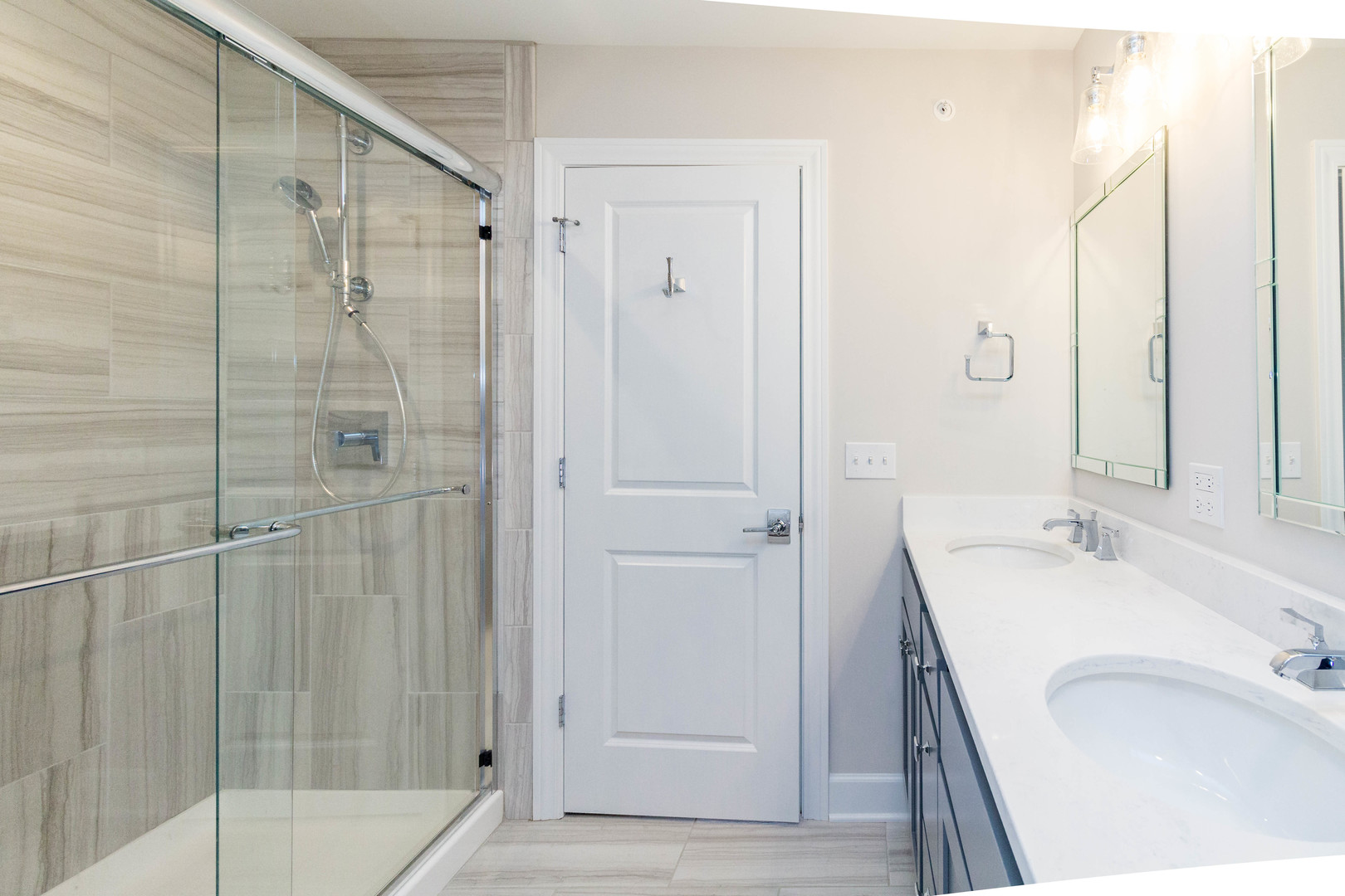 10723 Clock Tower Drive Countryside, IL 60525 - Photo 19 of 31 a bathroom with a sink a mirror and shower