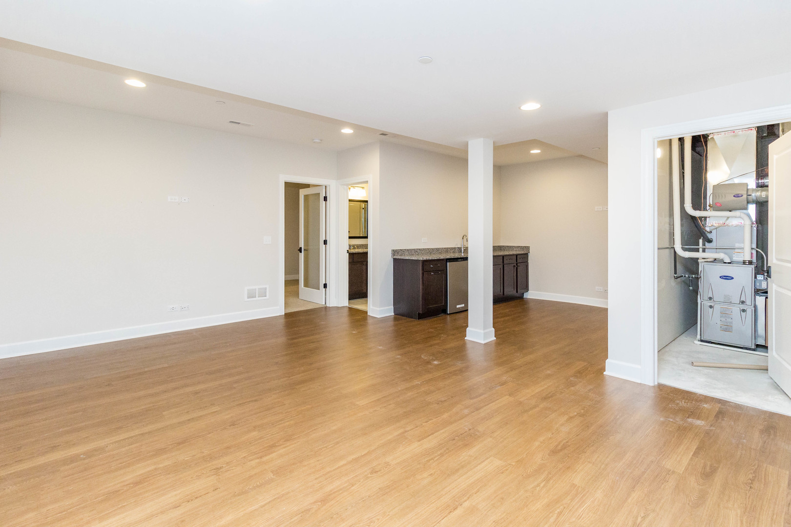 10723 Clock Tower Drive Countryside, IL 60525 - Photo 22 of 31 a view of a kitchen with a sink and a refrigerator