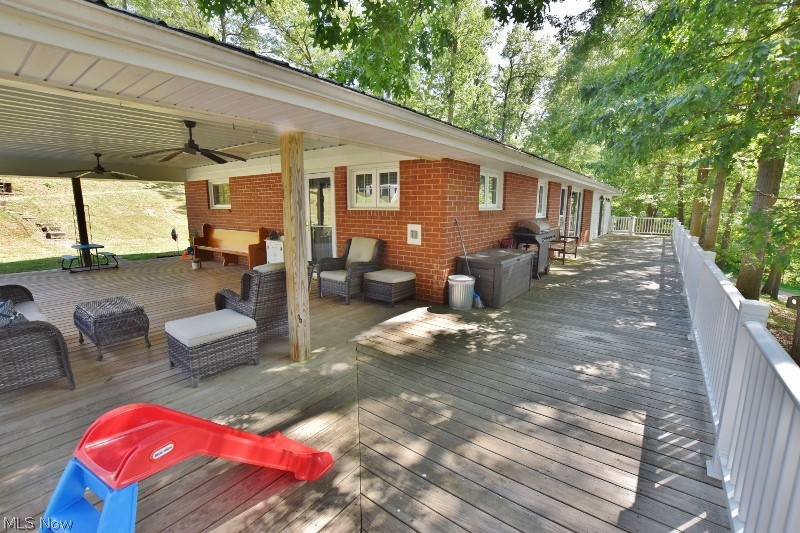 5007 Raven Road Southeast Carrollton, OH 44615 - Photo 10 of 50 Another angle showcasing the the entire wrap around deck.