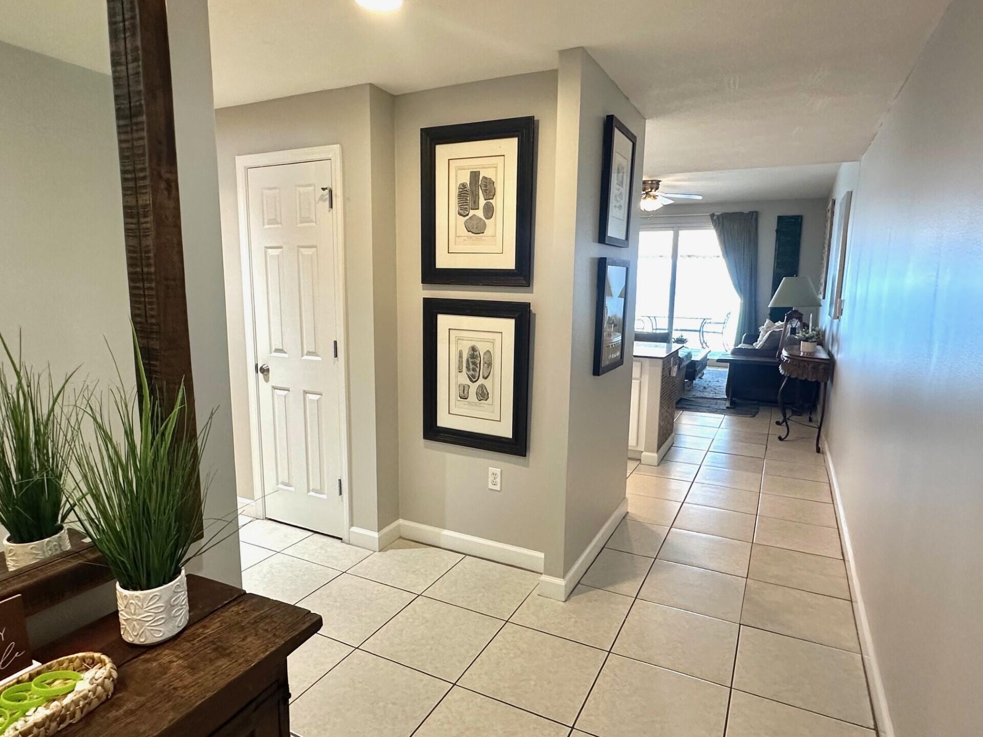 12011 Front Beach Road, Unit 103B Panama City Beach, FL 32407 - Photo 17 of 38 a view of livingroom with furniture and window