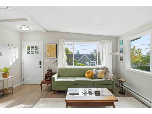 a living room with a couch and a table