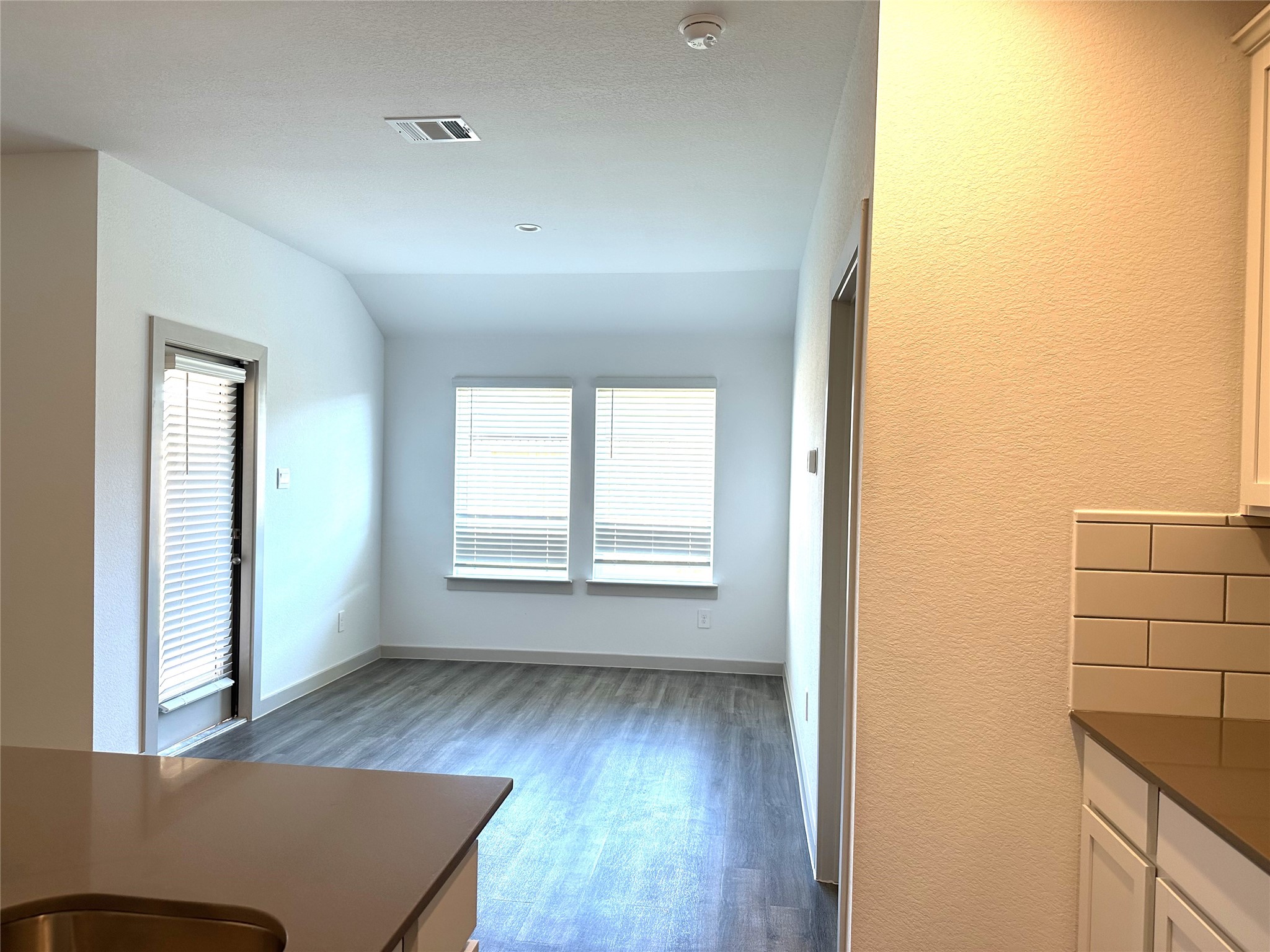 7815 Elm Birch Lane Rosharon, TX 77583 - Photo 12 of 19 wooden floor in an empty room with a window