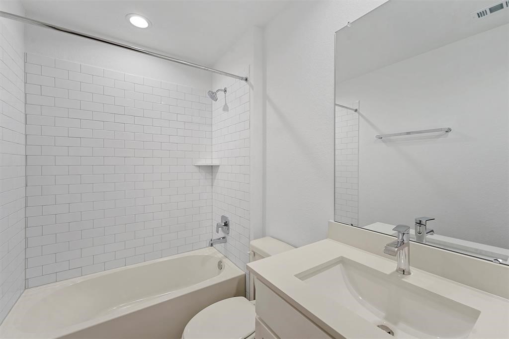 7815 Elm Birch Lane Rosharon, TX 77583 - Photo 6 of 19 a bathroom with a sink toilet and shower