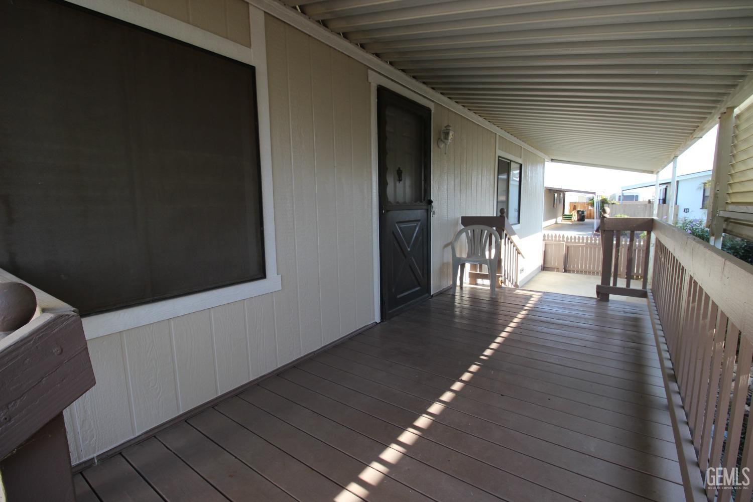 Undisclosed Address Bakersfield, CA 93307 - Photo 15 of 18 a view of a patio with table and chairs