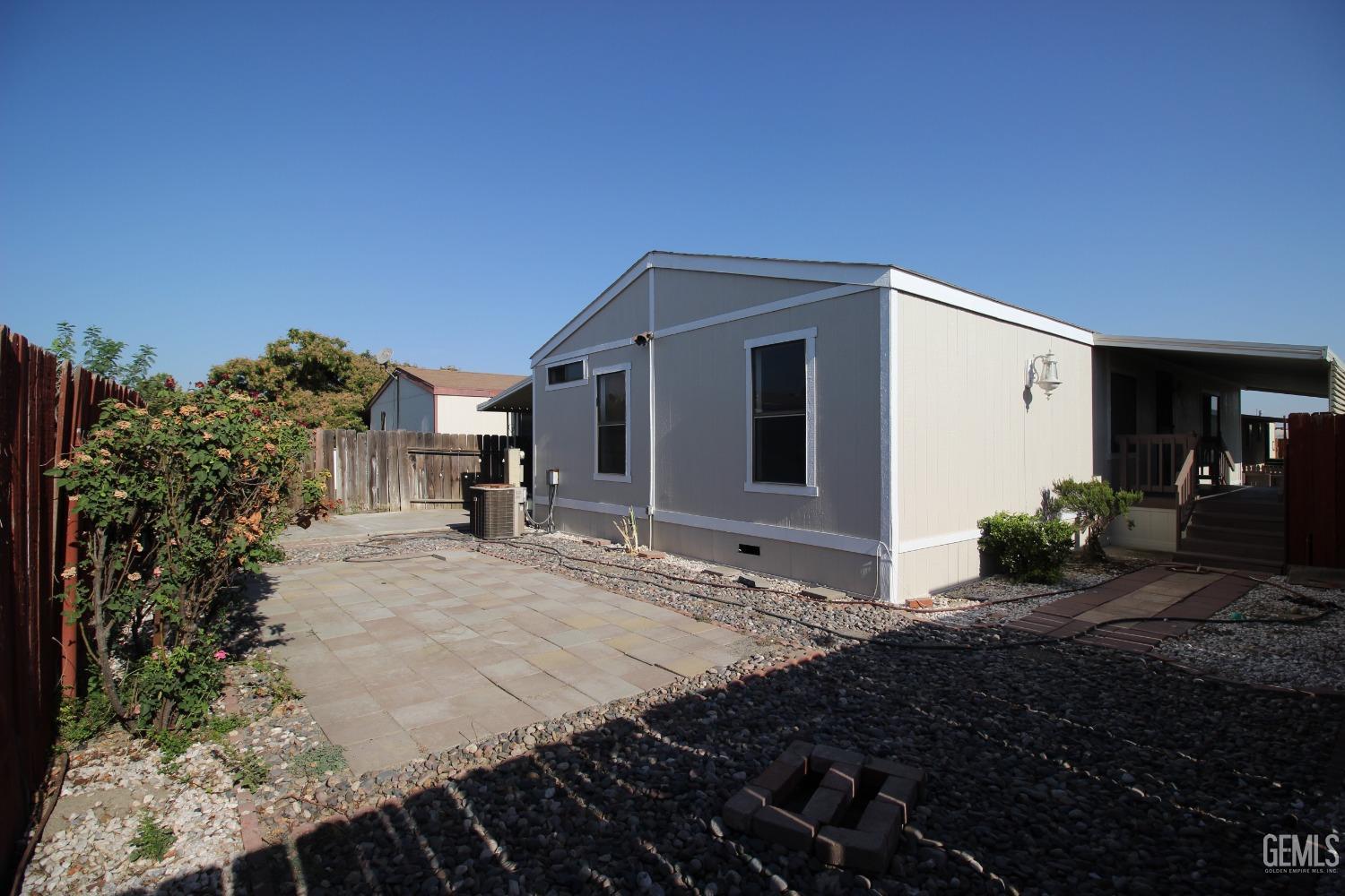 Undisclosed Address Bakersfield, CA 93307 - Photo 17 of 18 a house view with a outdoor space