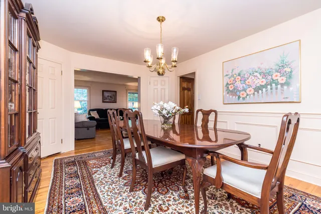 a work room with furniture and a window