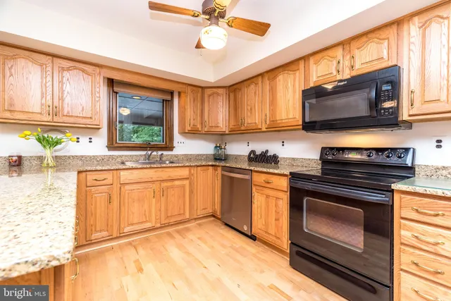 a workspace with furniture and window