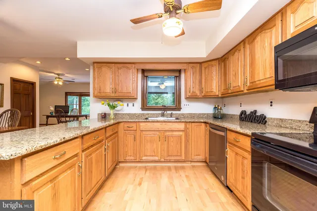 a view of a workspace with furniture