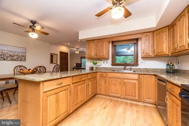 a utility room with sink dryer and washer