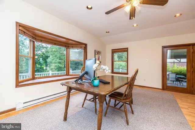 a bed room with a bed and a chandelier