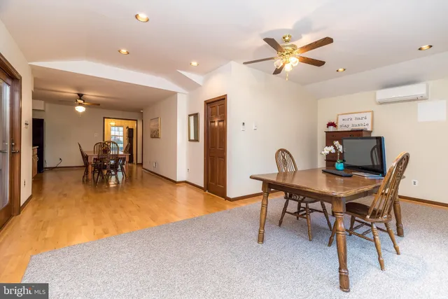 a bedroom with a bed furniture and a window