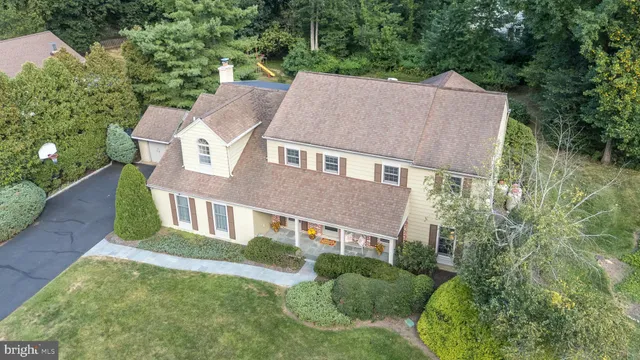 a view of a brick wall with an outdoor space