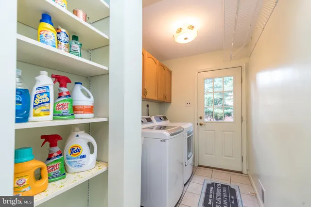 a room with a bed and a flat screen tv