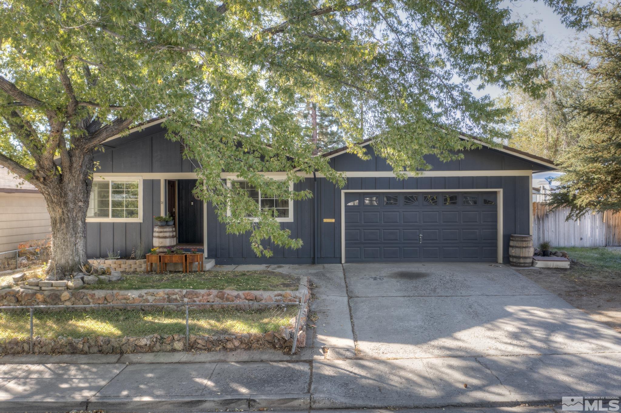 3465 Dawn Circle Sparks, NV 89431 - Photo 2 of 29 a view of a house with backyard and sitting area