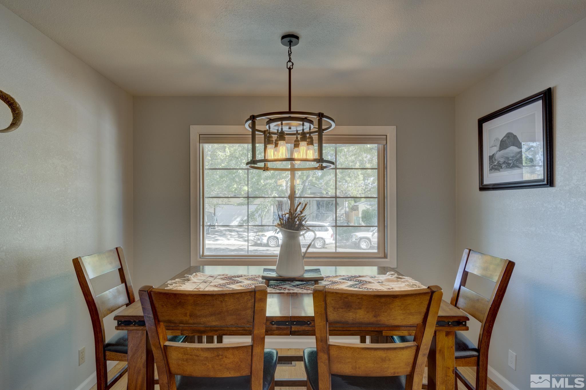 3465 Dawn Circle Sparks, NV 89431 - Photo 9 of 29 a dining room with furniture and window