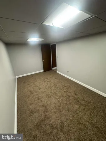 an empty room with a hallway