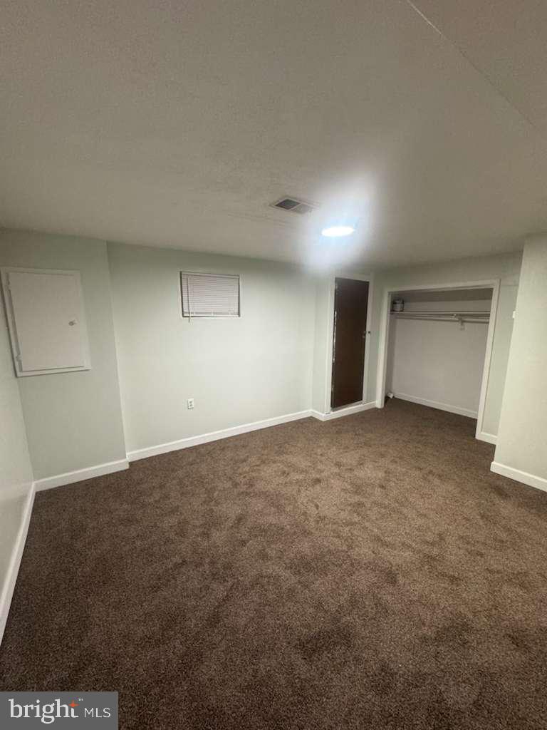 6112 Armor Drive Clinton, MD 20735 - Photo 6 of 15 a view of an empty room and a window