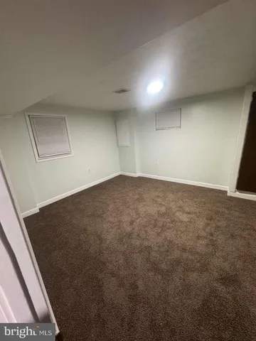 an empty room with a natural light