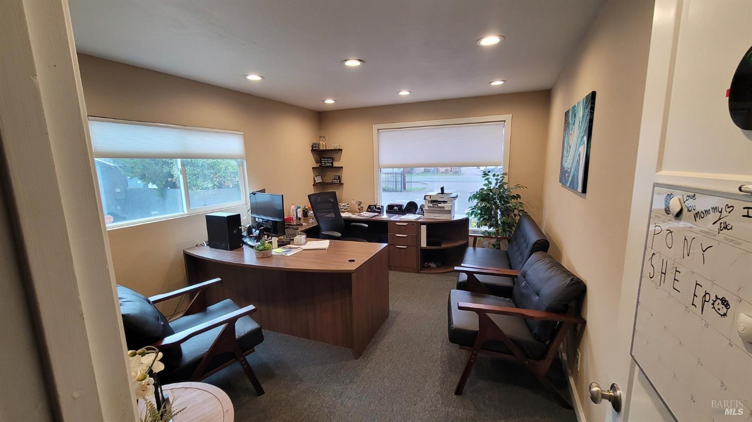 4135 Santa Rosa Avenue Santa Rosa, CA 95407 - Photo 34 of 42 a room with furniture a rug and a window