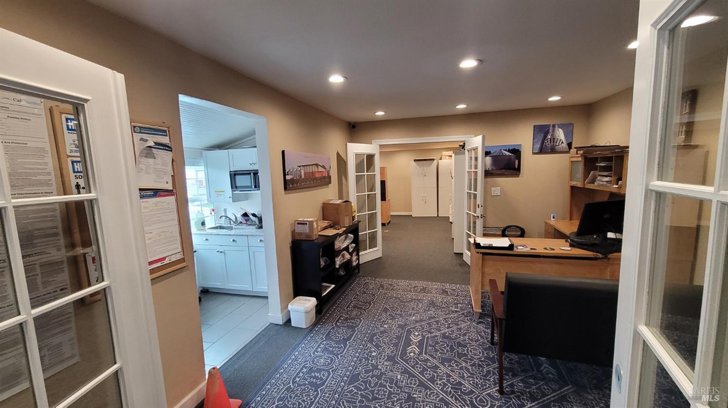 4135 Santa Rosa Avenue Santa Rosa, CA 95407 - Photo 37 of 42 a kitchen with refrigerator and table
