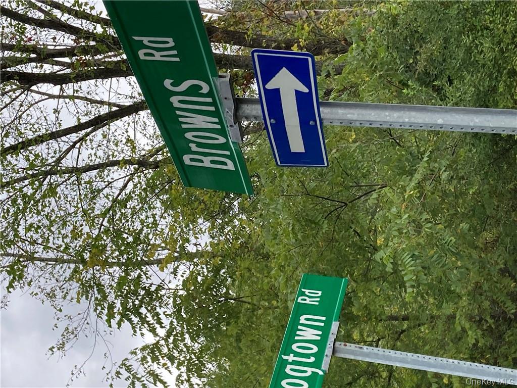 Logtown Road Port Jervis, NY 12771 - Photo 12 of 15 a sign that is sitting on a pole