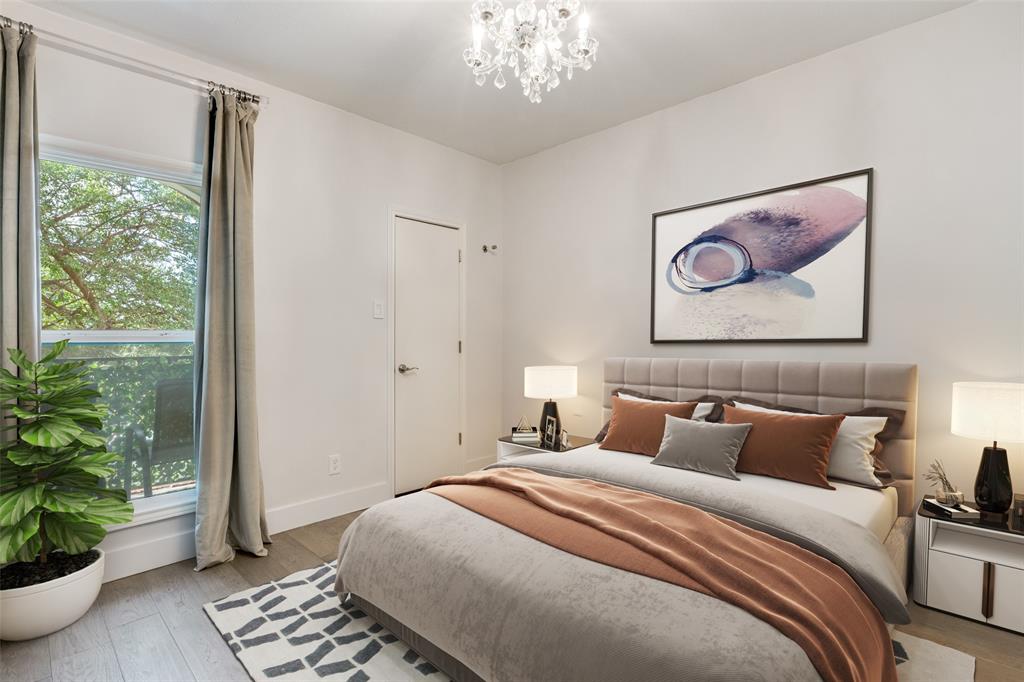 4034 Rawlins Street, Unit 104 Dallas, TX 75219 - Photo 3 of 19 a bedroom with bed and wooden floor